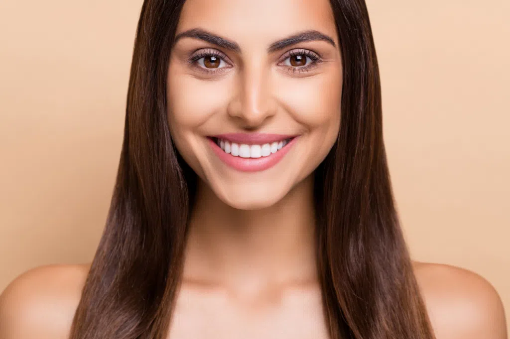 dental bonding orem Are you dreaming of a radiant smile that exudes confidence and warmth? At Sundance Family Dental in Orem, UT, we understand how a bright, beautiful smile can impact your self-esteem and overall well-being. We're thrilled to offer various cosmetic services to enhance natural beauty, including dental bonding in Orem. Led by the skilled hands of Dr. Kyle Birchall and Dr. Drew Miner, our team is dedicated to helping you achieve the smile you've always wanted. What is Dental Bonding? Dental bonding is a popular cosmetic procedure that involves applying a tooth-colored resin to the surface of your teeth. We will carefully shape and polish the resin to match the surrounding teeth, effectively improving the appearance of chipped, cracked, or discolored teeth. Dental bonding is minimally invasive, unlike other cosmetic treatments, making it an excellent option for those seeking quick and affordable improvements. Why Consider Dental Bonding? Dental bonding offers several compelling reasons for consideration, particularly if you want to improve your smile's aesthetics. Dental bonding can restore and enhance various imperfections, including: Chipped Teeth: Dental bonding can effectively repair chipped teeth, ensuring they regain their natural shape and strength. Cracked Teeth: We can fill and bond small cracks in teeth, preventing further damage and improving the tooth's appearance. Discolored Teeth: Bonding can cover stains or discolorations that do not respond to traditional whitening treatments. Gaps Between Teeth: Dental bonding is ideal for closing small gaps, creating a more uniform and aligned smile. Misshapen Teeth: The procedure can reshape teeth that are irregularly shaped, enhancing their overall appearance. Short Teeth: Bonding can add length to teeth that are shorter than desired, helping to create a more balanced and aesthetically pleasing smile. The Dental Bonding Process Understanding the dental bonding process can help alleviate any concerns or uncertainties. Consultation The procedure begins with a consultation, where your dentist will assess your needs and determine if bonding is the right option for you. During this appointment, you'll discuss your goals and preferences, allowing the dentist to tailor the treatment to your unique situation. Tooth Preparation Once you've decided to proceed with dental bonding, the next step is to prepare your teeth for the procedure. This preparation is relatively simple and involves lightly etching the tooth's surface to create a suitable bonding environment. A conditioning liquid is then applied to the area, promoting the adhesion of the resin material. Application With the tooth prepared, the dentist will apply the resin, carefully shaping it to achieve the desired effect. This step requires a keen eye for detail and artistry, as the resin must blend seamlessly with the surrounding teeth. Once the material is in place, we will use a curing light to harden it, finalizing the bonding process. Dr. Birchall or Dr. Miner will make any necessary adjustments and polish the tooth to perfection, leaving you with a stunning, refreshed smile. Benefits of Dental Bonding Dental bonding has numerous benefits, making it a popular choice among patients looking to enhance their smiles. Quick and Convenient: Dental bonding can often be completed in just one visit, making it an ideal option for those with busy schedules. The procedure requires minimal preparation and downtime, allowing you to enjoy your improved smile immediately. Cost-Effective: Dental bonding is more affordable than other cosmetic dental treatments like veneers or orthodontics. This makes it accessible to a broader range of patients without compromising the quality of the results. Versatility: Dental bonding can address various cosmetic concerns, including chipped, cracked, or discolored teeth and gaps between teeth. Its versatility allows personalized treatments to meet each patient's unique needs, ensuring a natural and aesthetically pleasing outcome. Dental Bonding in Orem Dental bonding at Sundance Family Dental in Orem presents an excellent opportunity to enhance your smile with minimal effort and expense. With the expertise of Dr. Kyle Birchall and Dr. Drew Miner, you can achieve stunning, personalized results that boost your confidence and transform your appearance. We invite you to schedule a consultation with our team today! Dr. Kyle Birchall, Dr. Drew Miner. Sundance Family Dentistry. SureSmile Aligners, Dental Implants, Smile Makeovers, Same Day Emergency Services, Wisdom Teeth Extractions, Root Canals, Family Dental, Cosmetic Dentistry, Restorative Dentistry, General, Cosmetic, Restorative, and Emergency Dentistry. Dentist in Orem, UT 84057